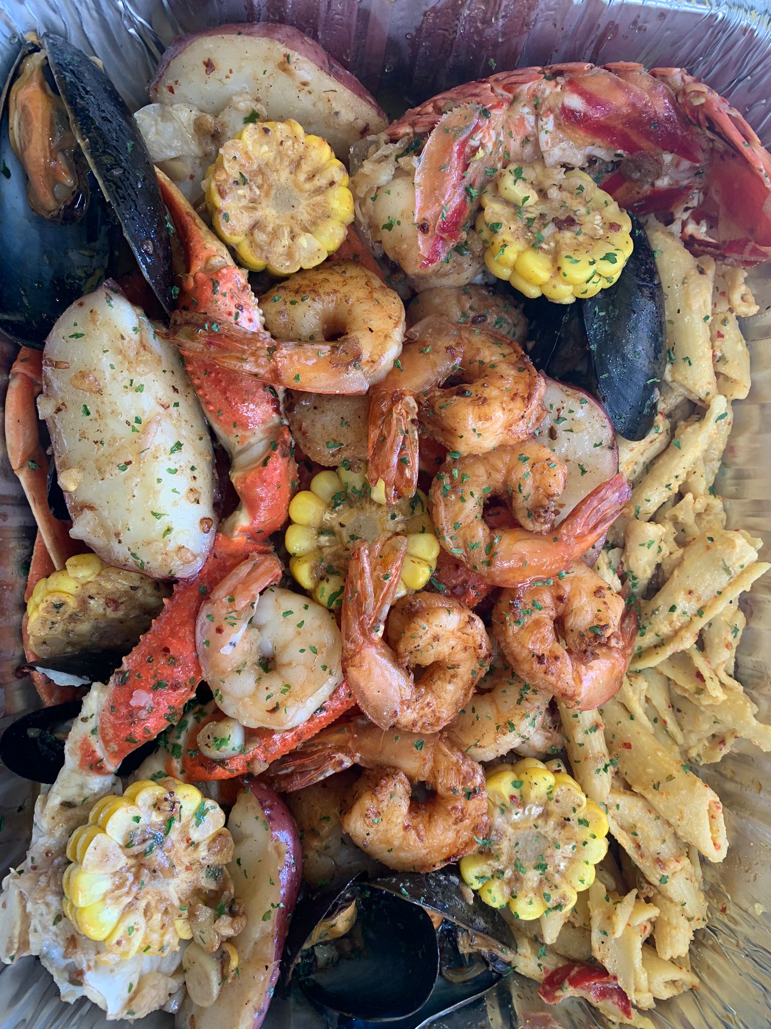 Jerk Lobster tail Crabs and Shrimp with 876 Pasta